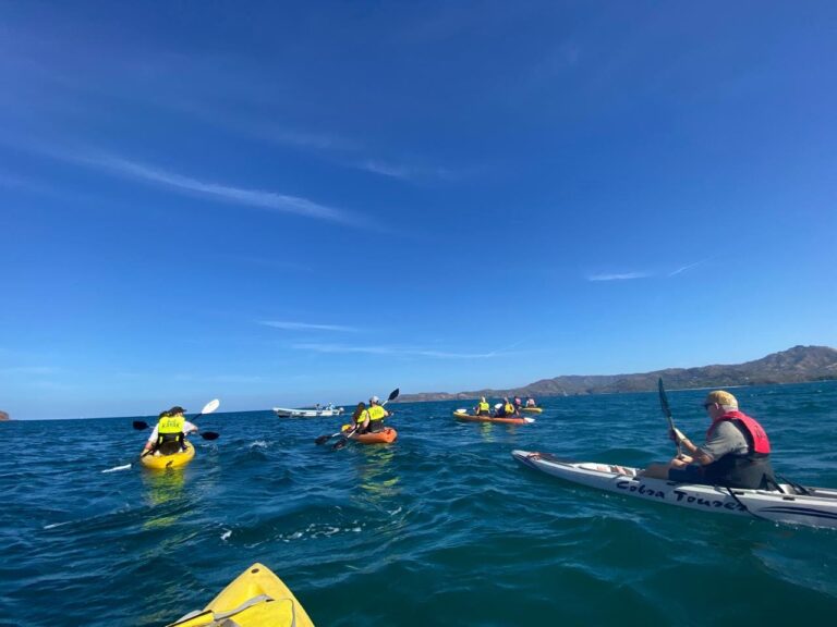 Kayaking along Playa Flamingo coastline