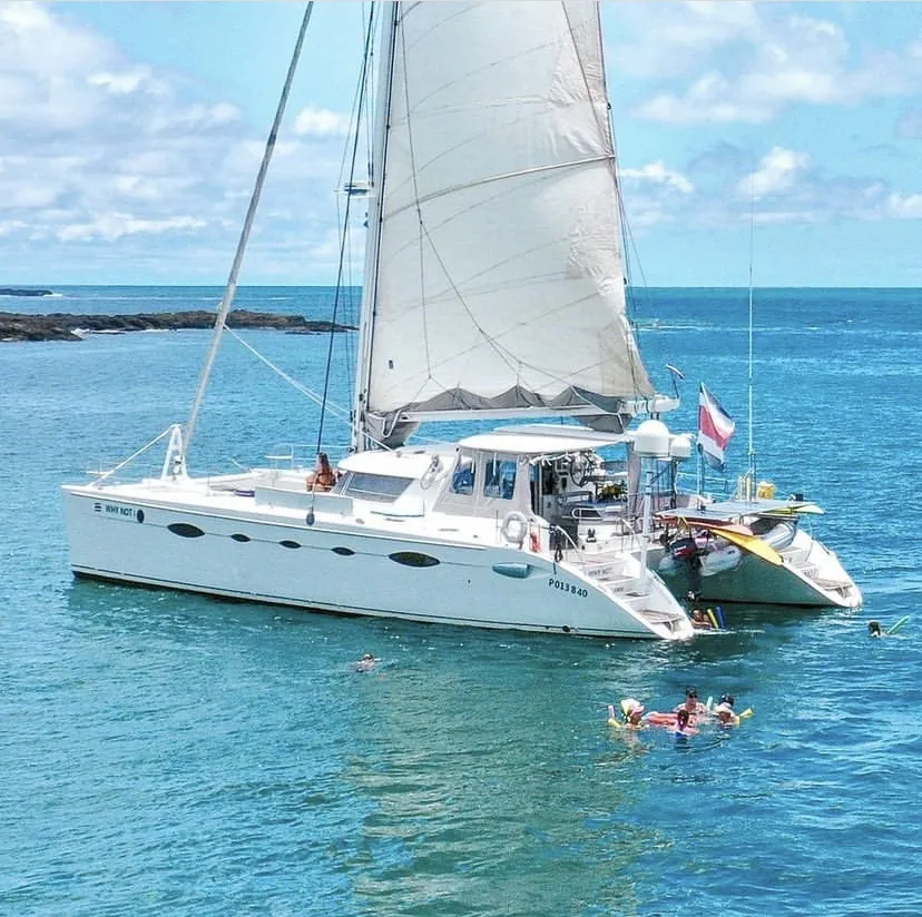 Why Not catamaran with its sail raised